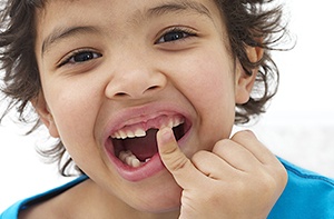 Little girl missing tooth