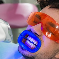 Man receiving teeth whitening