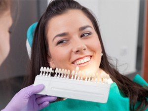 Woman listening to dentist in San Antonio  