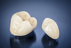 All-ceramic dental crowns on blue background