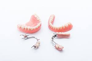 two full dentures and two partials 