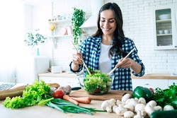 Woman makes a salad in San Antonio