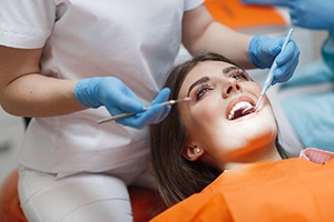 A female patient undergoing a dental checkup during an appointment
