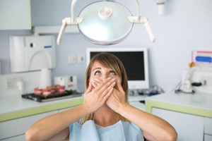 woman with fear of the dentist 