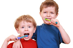 Kids brushing teeth