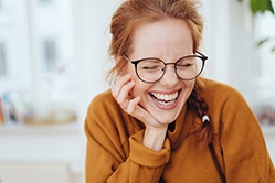 woman smiling after getting veneers in San Antonio