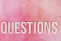 the word questions on a reddish background