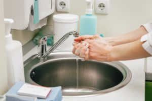 dentist in San Antonio washing their hands