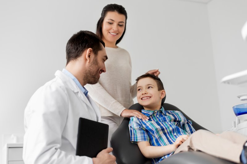 Mother and son seeing a pediatric dentist in San Antonio.