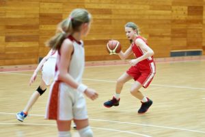 girl playing basketball 