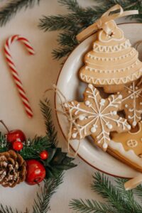 Candy canes and sugar cookies on holiday table